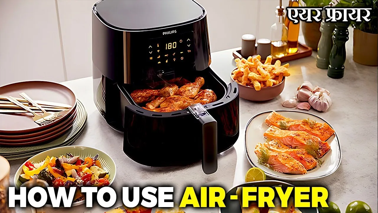 Air fryer with chicken wings beside fries and salmon for cooking times