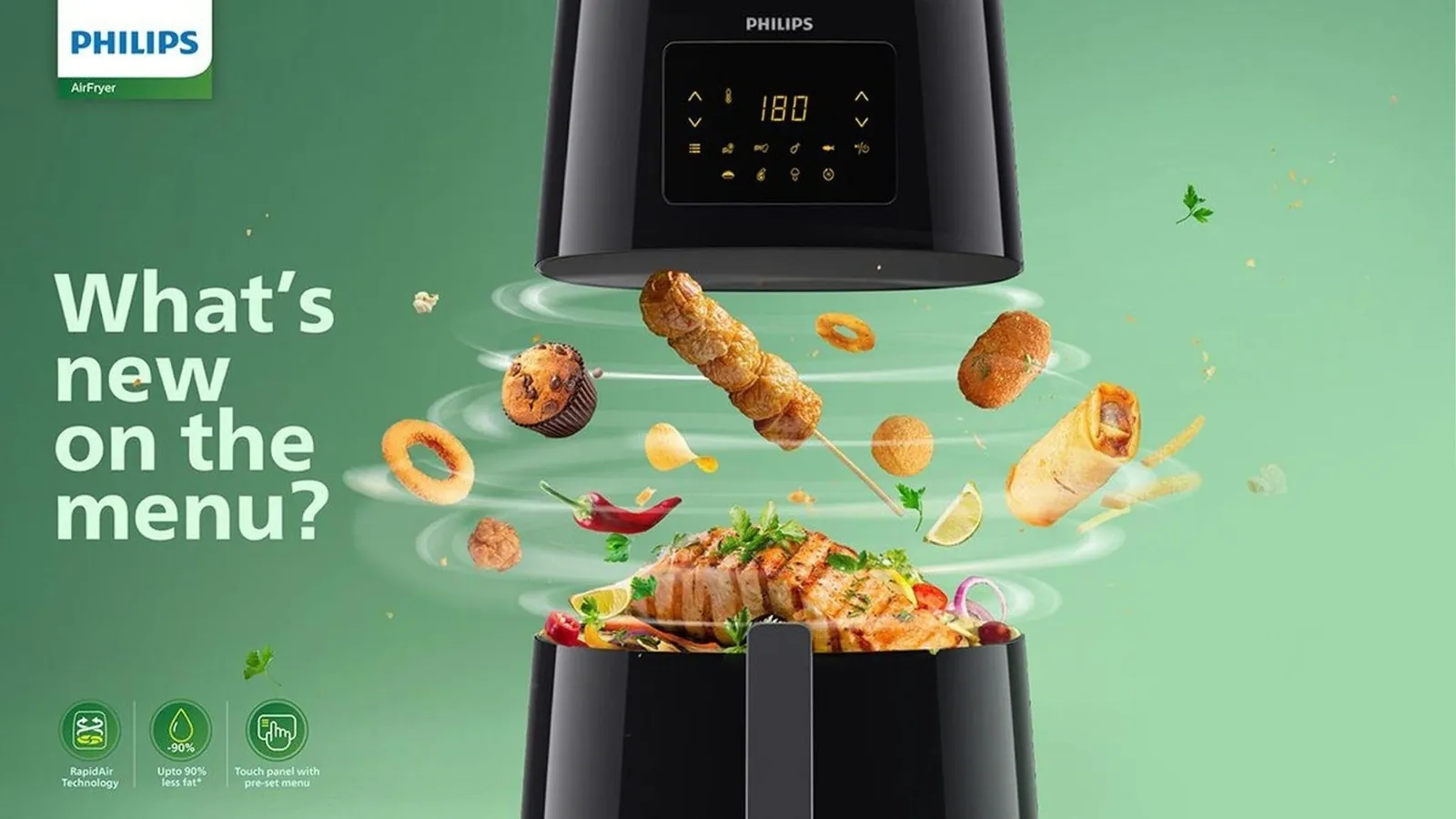 Air fryer on kitchen counter with clear space around its vents