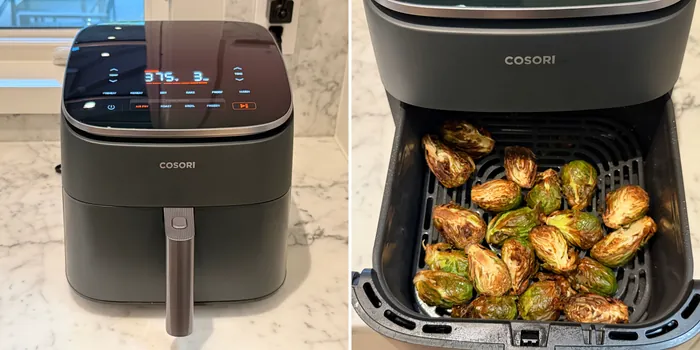 Overfilled air fryer basket with piled raw french fries